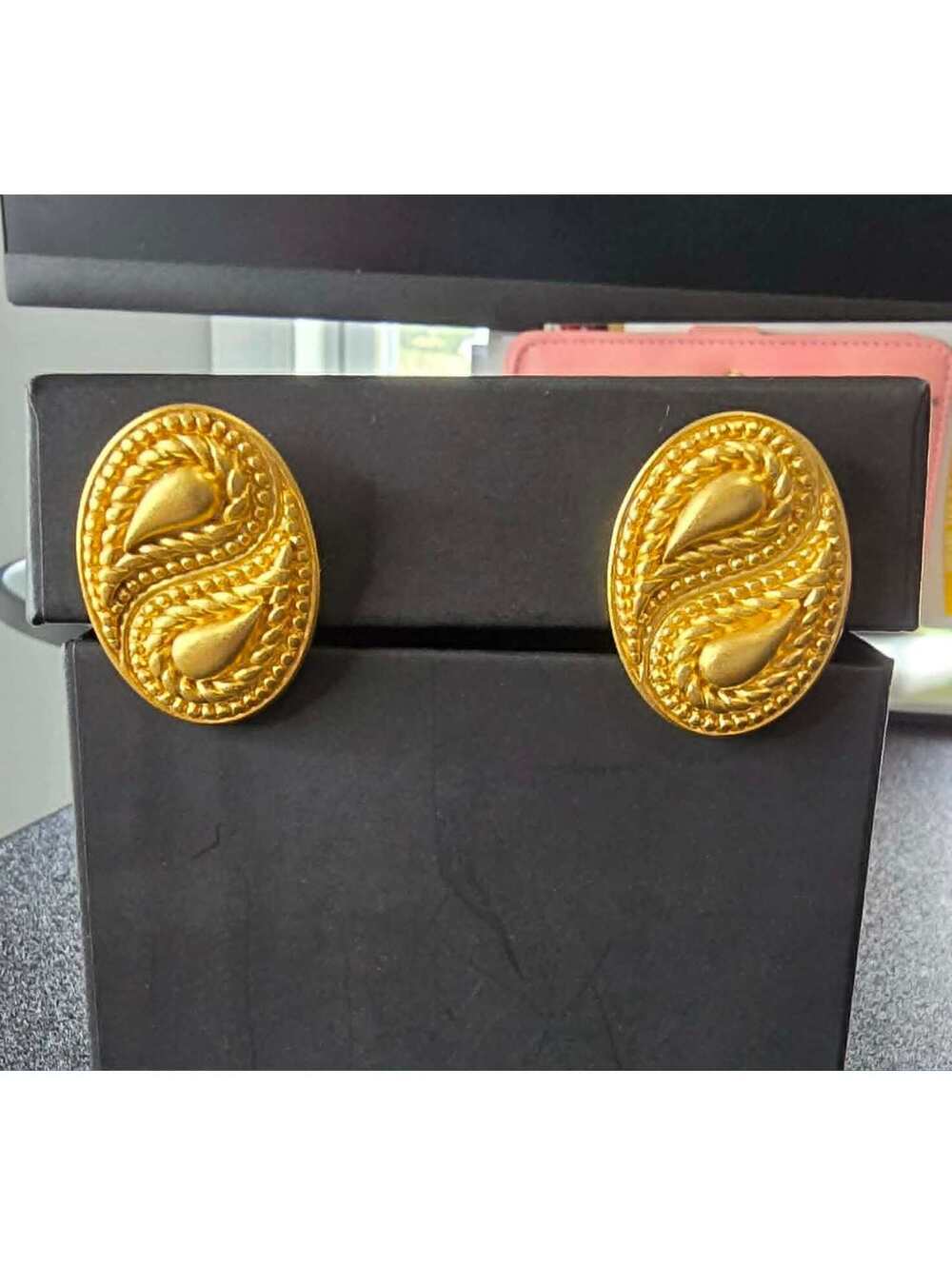 Vintage Monet gold tone paisley teardrop clip on earrings